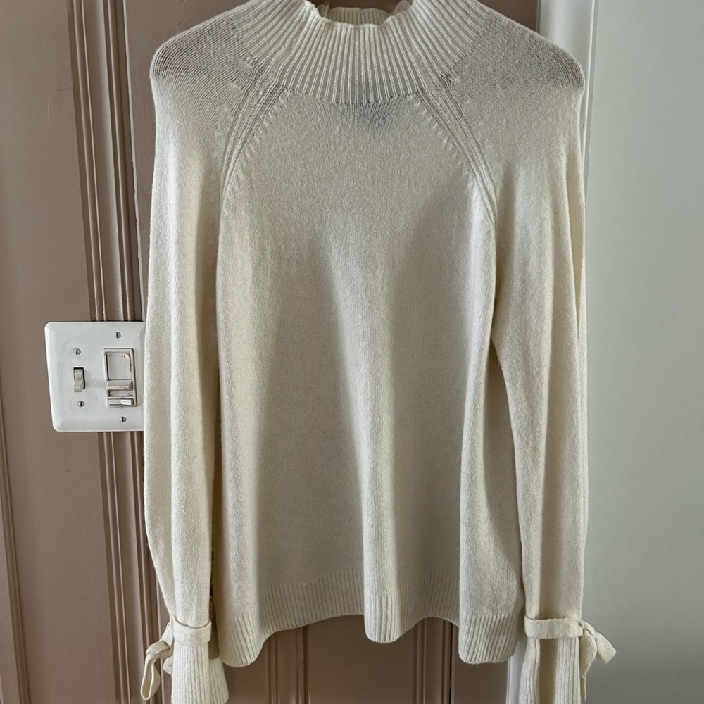 Beautiful Cynthia Rowley, mock turtleneck, sweater with bows on each wrist